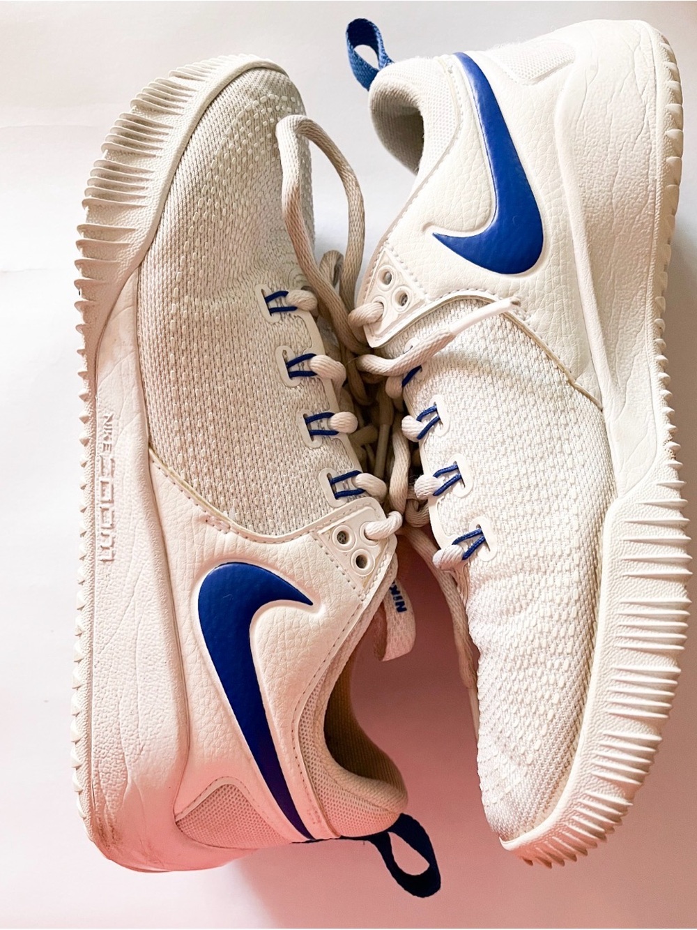 Nike White Sneakers with Blue Swoosh Accents